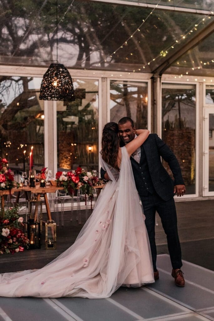 Elegant glass marquee wedding reception at Bayala Private Safari Lodge