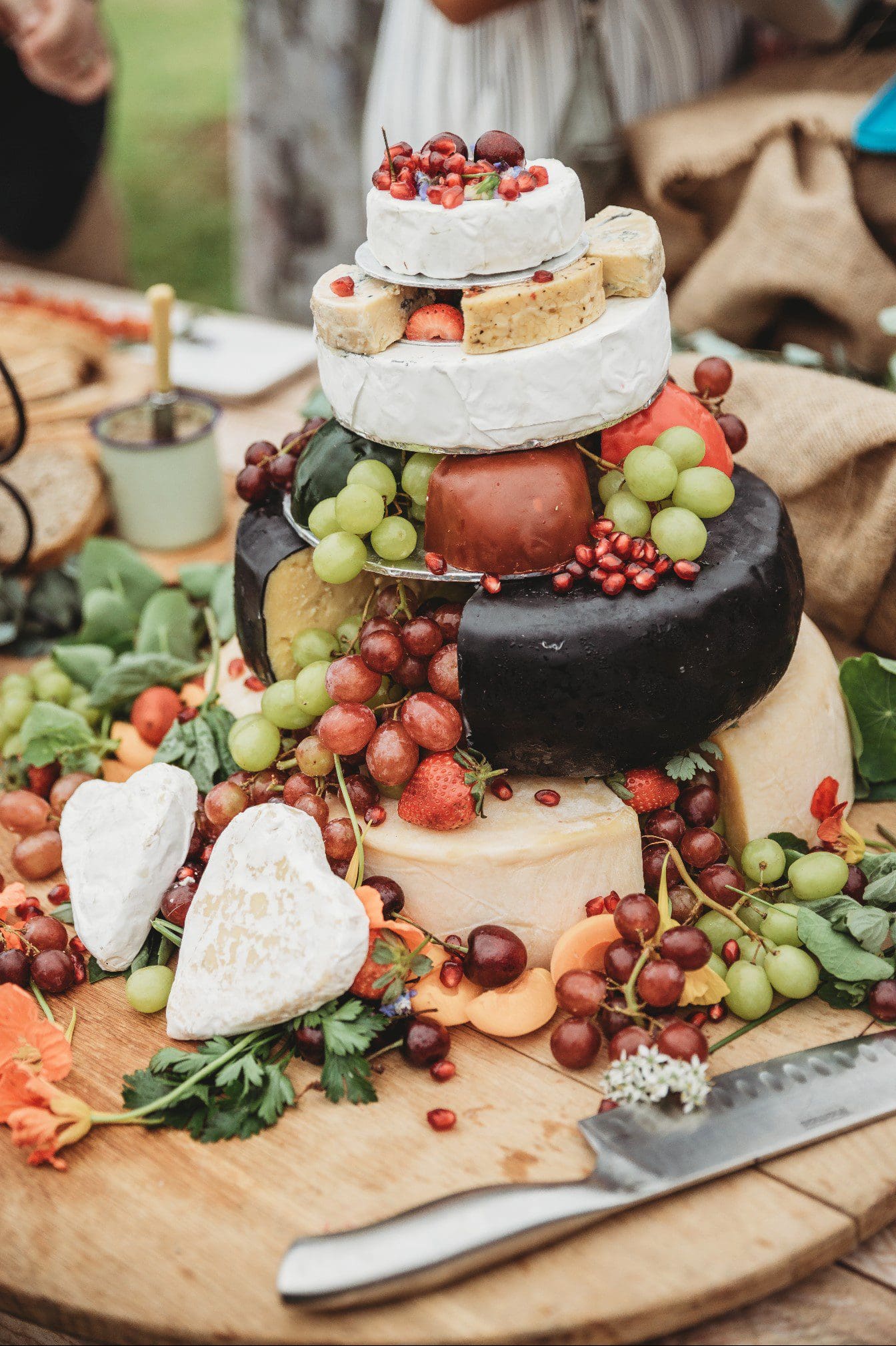 Cheese tower decorated with fruit