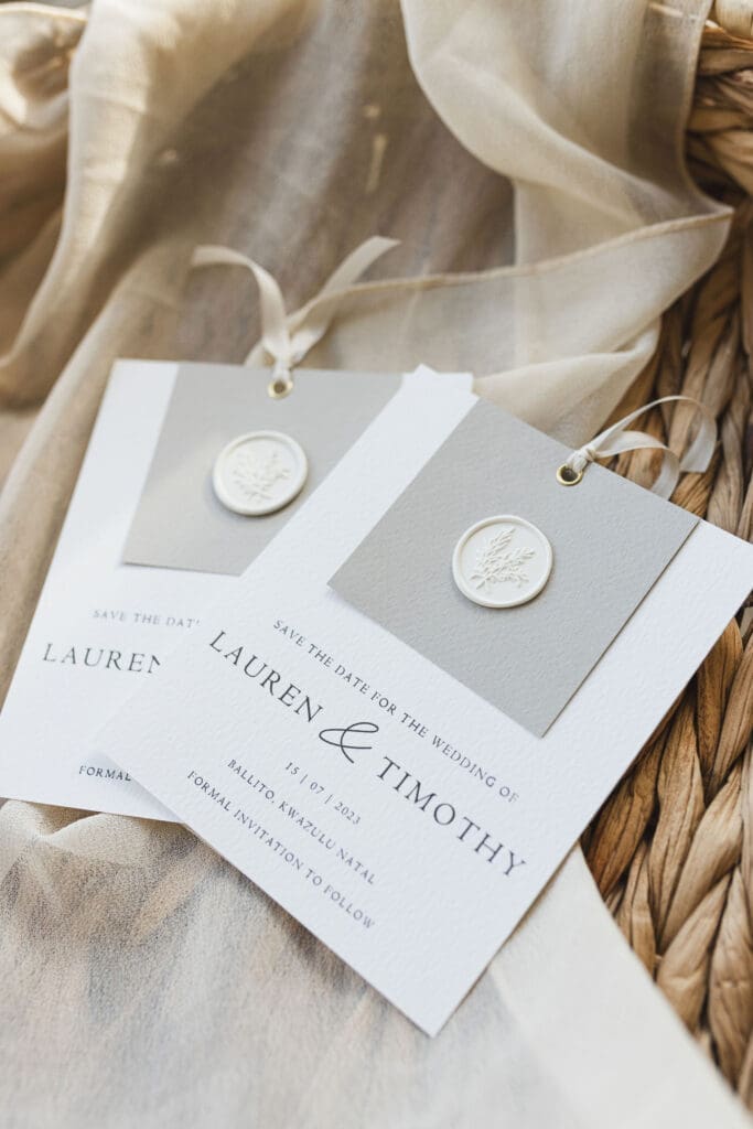 Save the date cards with wax stamp and ribbon