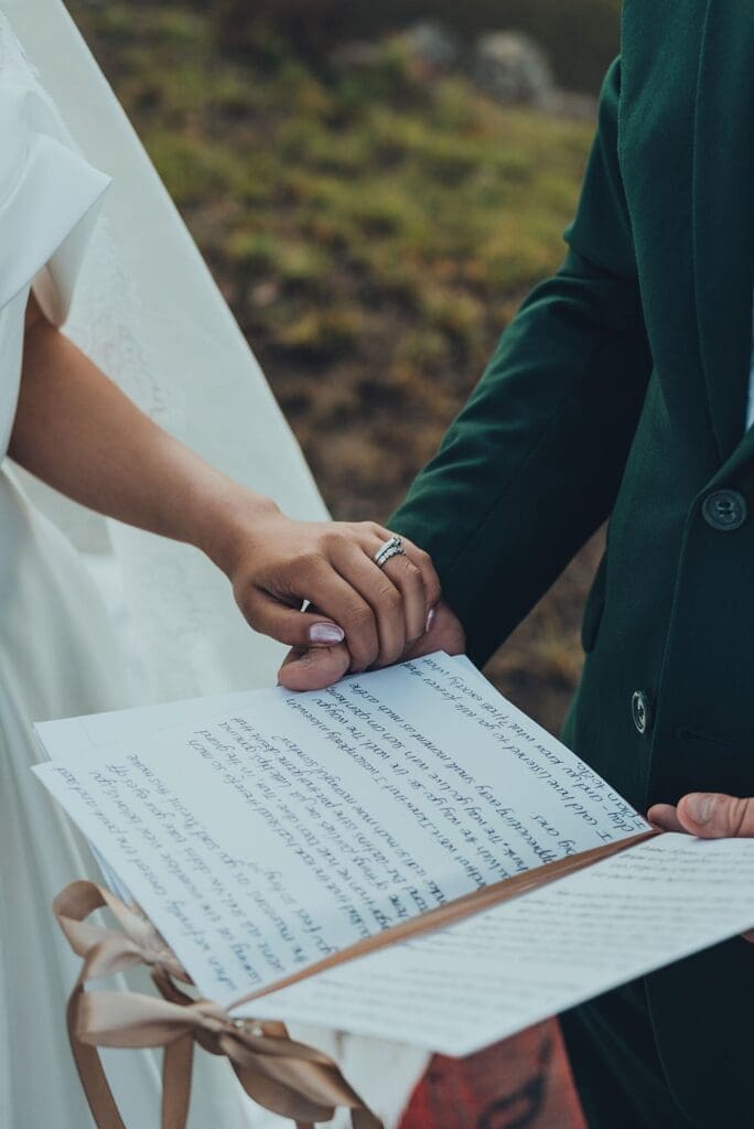 Close up of grooms personal vows