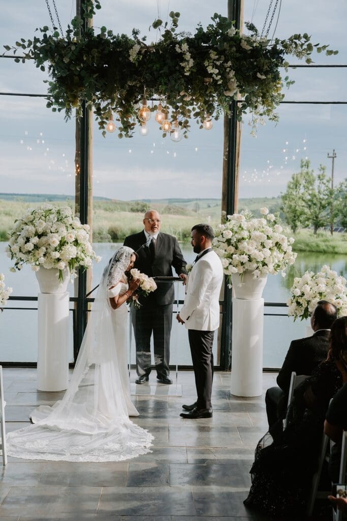 White wedding floral displays during ceremony